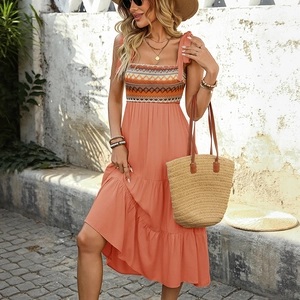 Bohemian coral orange tiered maxi dress with ethnic print and adjustable tie straps
