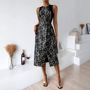 Elegant sleeveless black lace sheath dress with white lining and front slit detail