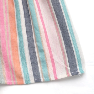 Macro shot of colorful striped rainbow fabric with premium hem stitching details
