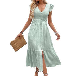 Light green V-neck summer dress with smocked waist and ruffled sleeves in textured fabric