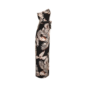 Detail of tropical palm leaf print on black strapless jumpsuit with waist tie belt