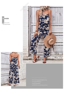 Detail of off-shoulder wide-leg jumpsuit with vintage floral print in navy and white