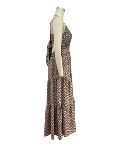 Detail of the back bow knot and tiered ruffle structure on the summer backless maxi dress