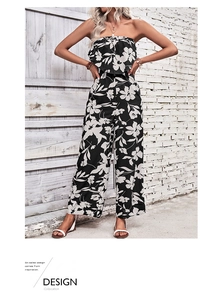 Detailed close-up of ruffle strapless neckline and floral print on high waist jumpsuit