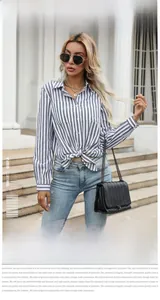Detail of blue striped shirt with button-down front and stylish waist-knot design