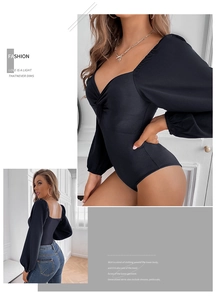 Detail of French twist knot V-neckline on black ribbed long sleeve bodysuit
