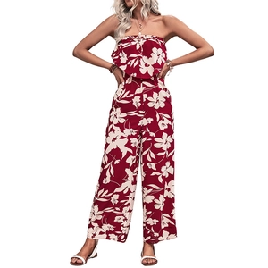 Burgundy off-shoulder jumpsuit with large floral print and wide-leg trousers for summer