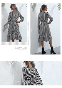 Detailed views of a black and white vertical striped dress with ruffle hem and high neck