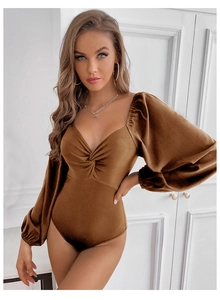 Detail of dark brown velvet bodysuit with sweetheart neckline and ruched twist front bodice