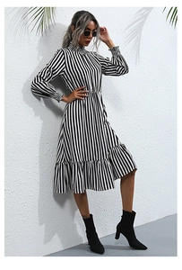 Vertical striped dress featuring a high pleated neckline and elegant ruffled hemline