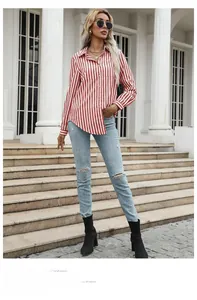 Close-up of red striped button-down shirt with collar and chest pocket detail