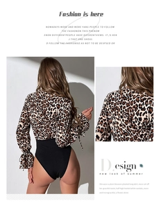 Detail showing slim-fit leopard print long sleeve bodysuit with sleek back view design