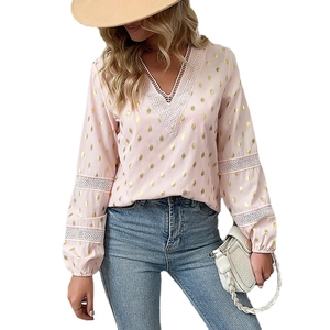 Pink long sleeve V-neck shirt with gold polka dots and white hollow lace detailing