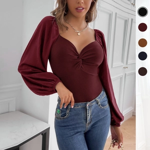 Burgundy long sleeve bodysuit with sweetheart twist neckline and ribbed texture for women