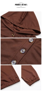 Detail view showing the buttoned collar, hood, and elastic cuffs of this brown knit hoodie