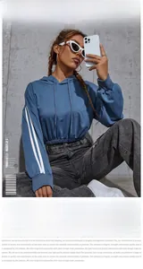 Blue cropped hoodie for women featuring white side stripes on sleeves and casual hood