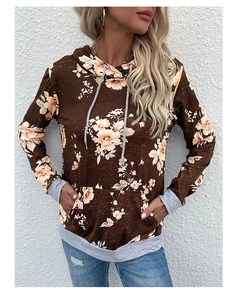 Front view of brown floral hoodie with grey contrast cuffs and drawstring pocket