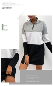 Detail of three-color patchwork longline sweatshirt dress with half-zip collar and long sleeves