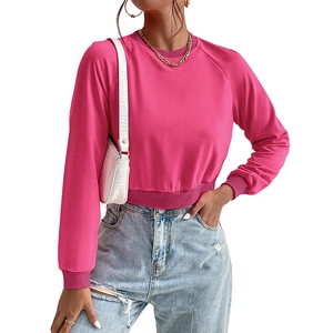 Women's rose pink cropped sweatshirt with long sleeves and ribbed crewneck design