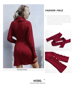 Detail showing elegant pearl buttons on cuffs and matching tie waist of dark red knit dress