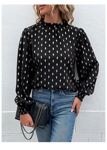 Detail of elegant black long sleeve blouse with golden diamond patterns and ruffle collar