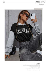 Detalle de la sudadera color block con estampado de California y diseño corto de moda