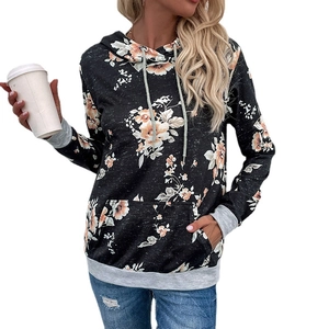 Women's floral print hoodie featuring grey patchwork cuffs and front pocket detail