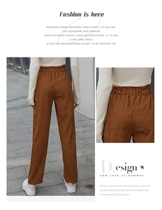 Detail of high waist elastic waistband on brown corduroy straight leg trousers for women