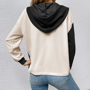 Women's color block waffle knit hoodie in beige and black, back view casual style