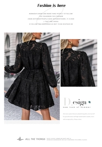 Detail of black long-sleeve dress with 3D feathered lace texture and A-line silhouette