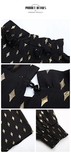 Detail of ruffled collar and golden diamond pattern on black long sleeve shirt
