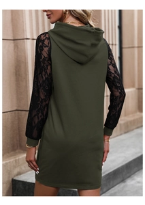Detail view of olive green hooded dress with black lace sleeves and fitted silhouette