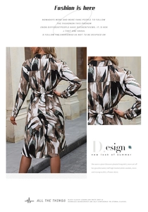 Detail of the waist tie bow and abstract leaf print on this long sleeve shirt dress