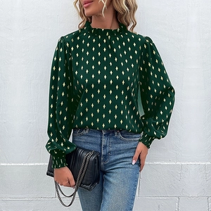 Women's emerald green long sleeve shirt with gold geometric pattern and ruffled collar
