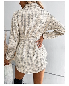 Back view of a long plaid tweed coat with adjustable waist belt and metal button details