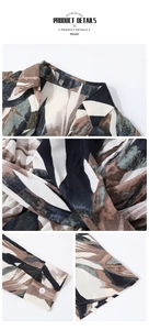 Detail view of the tropical leaf print, fabric texture, and button on the long sleeve dress