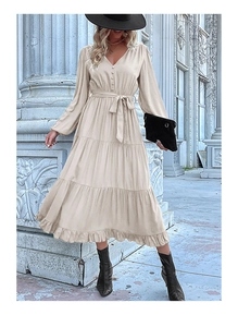 Detail of a beige V-neck tiered maxi dress with long sleeves and pleated ruffles