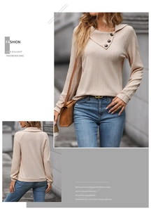 Detail view of beige textured knit sweatshirt with unique irregular lapel and buttons