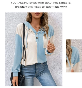 Dettaglio della felpa in maglia a nido d'ape con collo Henley e taschino sul petto
