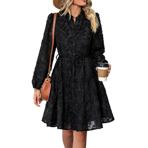 Elegant black long sleeve tiered lace dress with button front and waist tie belt