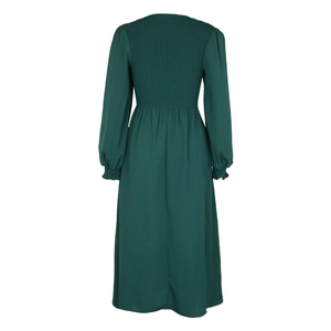 Detail of smocked back and puff sleeves on this elegant dark green long-sleeved dress