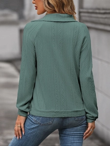 Rear view of a dark green textured pullover with a turnover collar and ribbed details