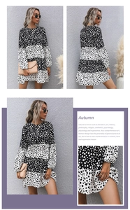 Detailansicht des schwarz-weißen Polka-Dot-Patchwork-Musters auf dem herbstlichen Kleid