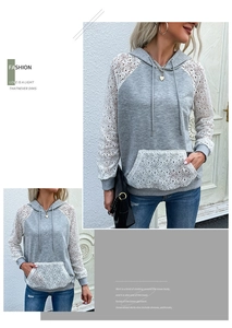 Gros plan d'un sweat à capuche gris pour femme avec manches en dentelle et poche kangourou