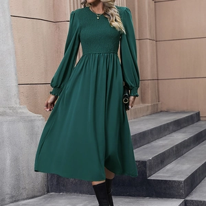 Elegant dark green A-line long sleeve midi dress with smocked bodice and cuffs