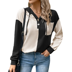 Women's color block hoodie featuring waffle knit fabric with buttons and drawstring hood