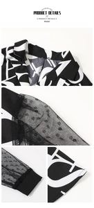Detail showing mesh polka dot sleeves and letter print fabric texture on the stylish top