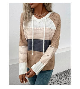 Detail of multi-color striped pointelle knit hoodie with V-neck and drawstring details