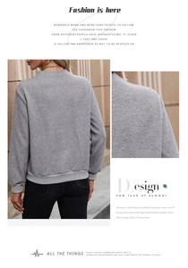 Détail du sweat gris montrant la texture matelassée en losange et les poignets côtelés