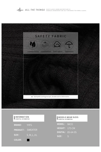Detail view of black knit sweater fabric showing breathable texture and soft material